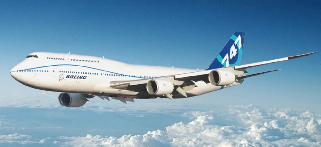 A Boeing 747 flying above the clouds